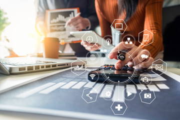 Business team meeting present.professional investor working with new startup project. Finance managers task.Digital tablet laptop computer design smart phone in morning light.