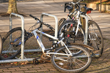 Fototapeta na wymiar Abandoned bicycles in an urban setting