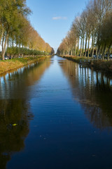 Fototapeta na wymiar View on canal with trees