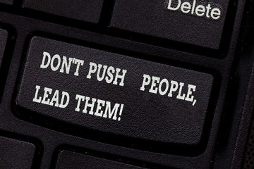 Writing note showing Don T Push People Lead Them. Business photo showcasing Be kind and motivate your staff to take action Keyboard key Intention to create computer message pressing keypad idea