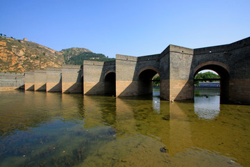 Fototapeta premium China ancient Great Wall building landscape in the water