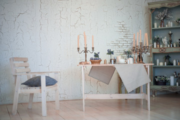 The interior of the room in the classic style with elements of Christmas decor.