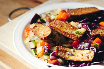 Smoked tofu with sesame and chopped vegetables