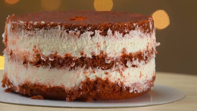 Naked layer cake with red velvet and chocolate biscuit and cream
