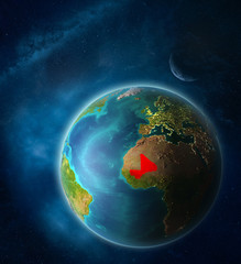 Mali from space on planet Earth in space with Moon and Milky Way. Extremely fine detail of planet surface.