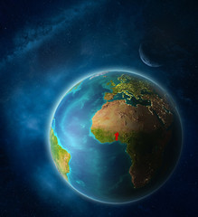 Benin from space on planet Earth in space with Moon and Milky Way. Extremely fine detail of planet surface.