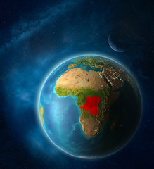Dem Rep of Congo from space on planet Earth in space with Moon and Milky Way. Extremely fine detail of planet surface.