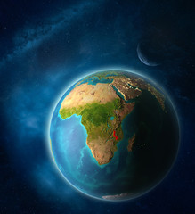 Malawi from space on planet Earth in space with Moon and Milky Way. Extremely fine detail of planet surface.