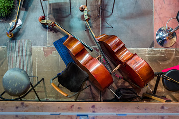 Contrabass are lying on the floor