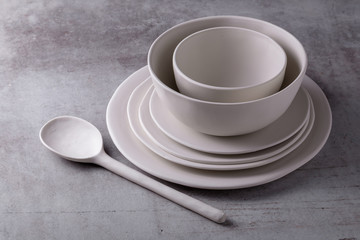 Empty blank white ceramic dish and white spoon ceramic on Cement Board