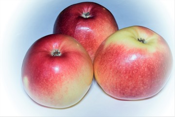4793041  TITLE: Three tasty, ripe fresh apples on white background isolated. 