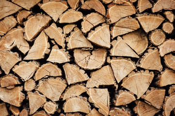Wooden natural cut logs textured background, side view