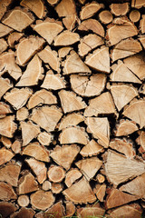 Wooden natural cut logs textured background, side view