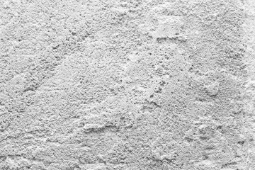 Rough weathered natural old stone wall background, various colored