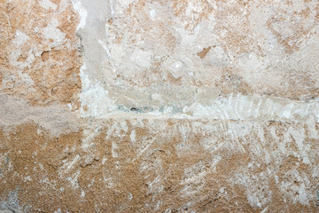 Rough weathered natural old stone wall background, various colored