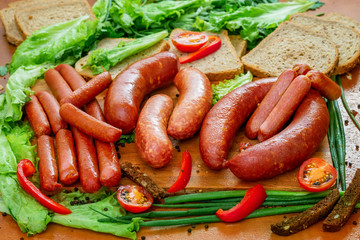 Stack of sausages with greens closeup