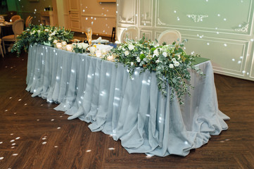 Luxury, elegant wedding reception table arrangement, floral centerpiece