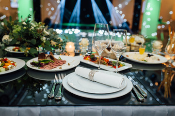 Luxury, elegant wedding reception table arrangement, floral centerpiece