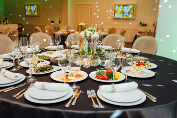 Luxury, elegant wedding reception table arrangement, floral centerpiece