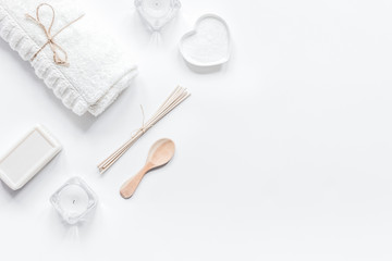 bodycare concept with white set of cosmetics on woman desk top v