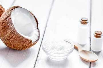 organic cosmetics concept with coconut on table background mocku