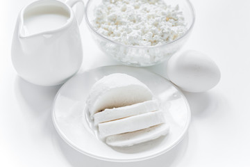 Fresh dairy products on white desk background