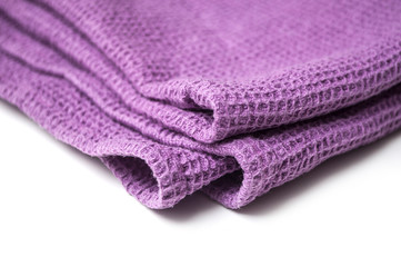 closeup of purple cleaning towel on white background