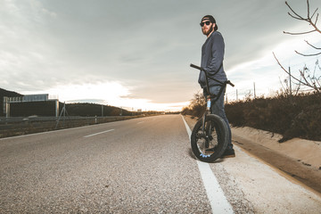 BMX rider. Young man with a bmx bike. Extreme sports