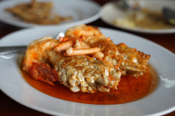 Fresh river prawn stir fried with chili and salt serving on the white plate