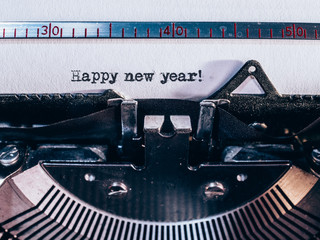 old typewriter with text 'happy new year''