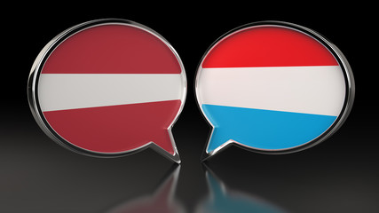 Obraz premium Latvia and Luxembourg flags with Speech Bubbles. 3D illustration