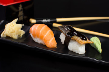 Salmon fish and salmon skin niguiri in restaurant table