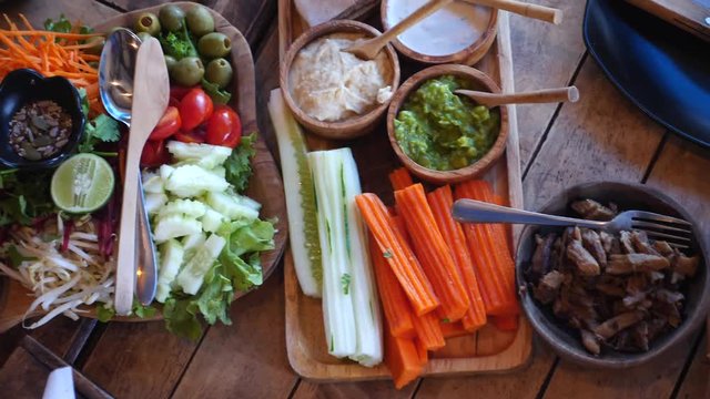 Wide Variety Of Vegan Food Presented On Table In Healthy Food Restaurant