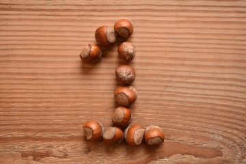 the number 1 shaped with hazelnuts