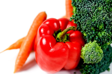 a fresh group of vegetables on white background