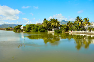 Fototapeta na wymiar River scene in Mahebourg, Mauritius. Mahebourg is a small city on the south-eastern coast of Mauritius.