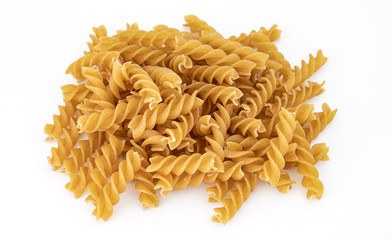 wholewheat fusilli pasta isolated on white background