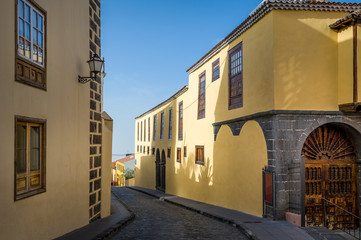 Fototapeta premium Old street leads to the Atlantic ocean shore