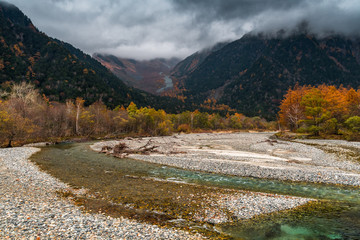 Fototapeta na wymiar Azusa River seen from Kappabashi Bridge in Autumn in Kamikochi, Japanese Alps, Chubu Sangaku National Park