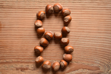 the number 8 shaped with hazelnuts