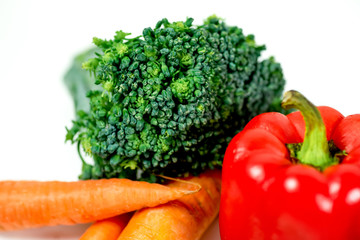 a fresh group of vegetables on white background