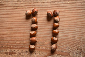 the number 11 shaped with hazelnuts