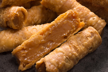 Traditional Brazilian pastry candy called canudinho close