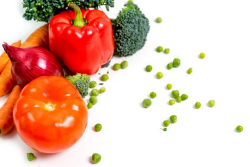a fresh group of vegetables on white background