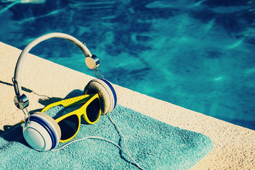 Spa accessories for relaxing and restoring - headphones and sunglasses - copy space