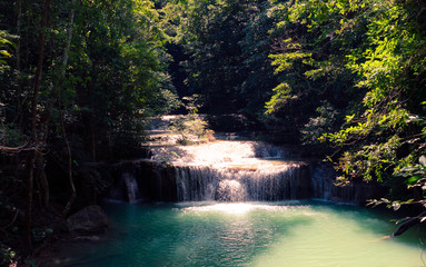 Small waterfall are beautiful colors. Exposure to the sun's warmth in national park of Thailand.