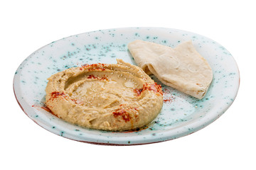Hummus with sesame lavash. Vegetarian dish. On white background