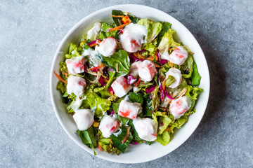 Crab Sticks Surimi Salad with Sauce. in Glass Bowl.