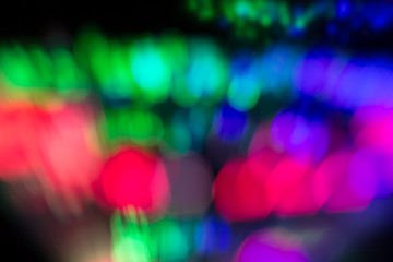 Defocused colored luminous spots. For background