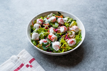 Crab Sticks Surimi Salad with Sauce. in Glass Bowl.